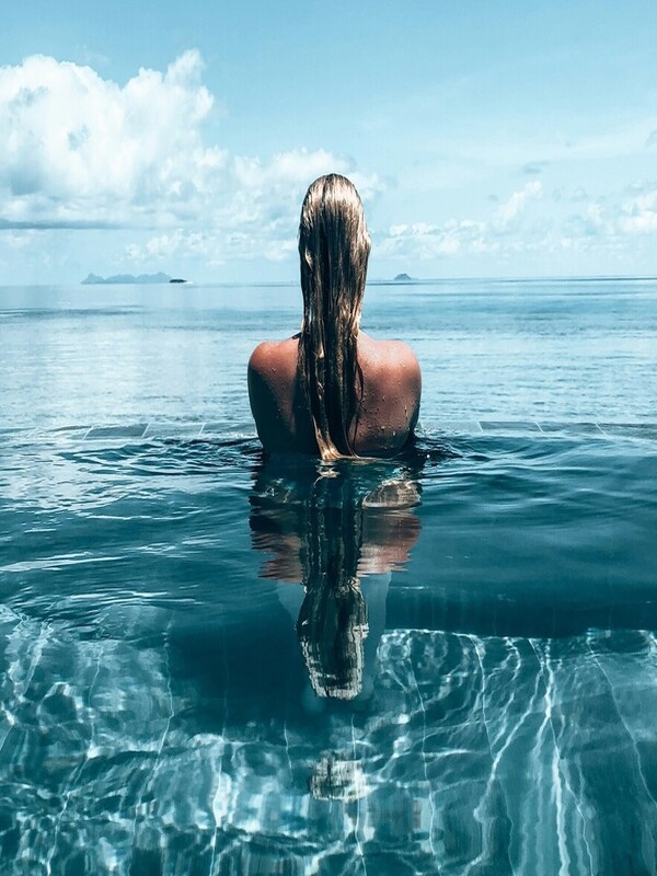 1st quarter image - Woman in pool Fijian Poolside